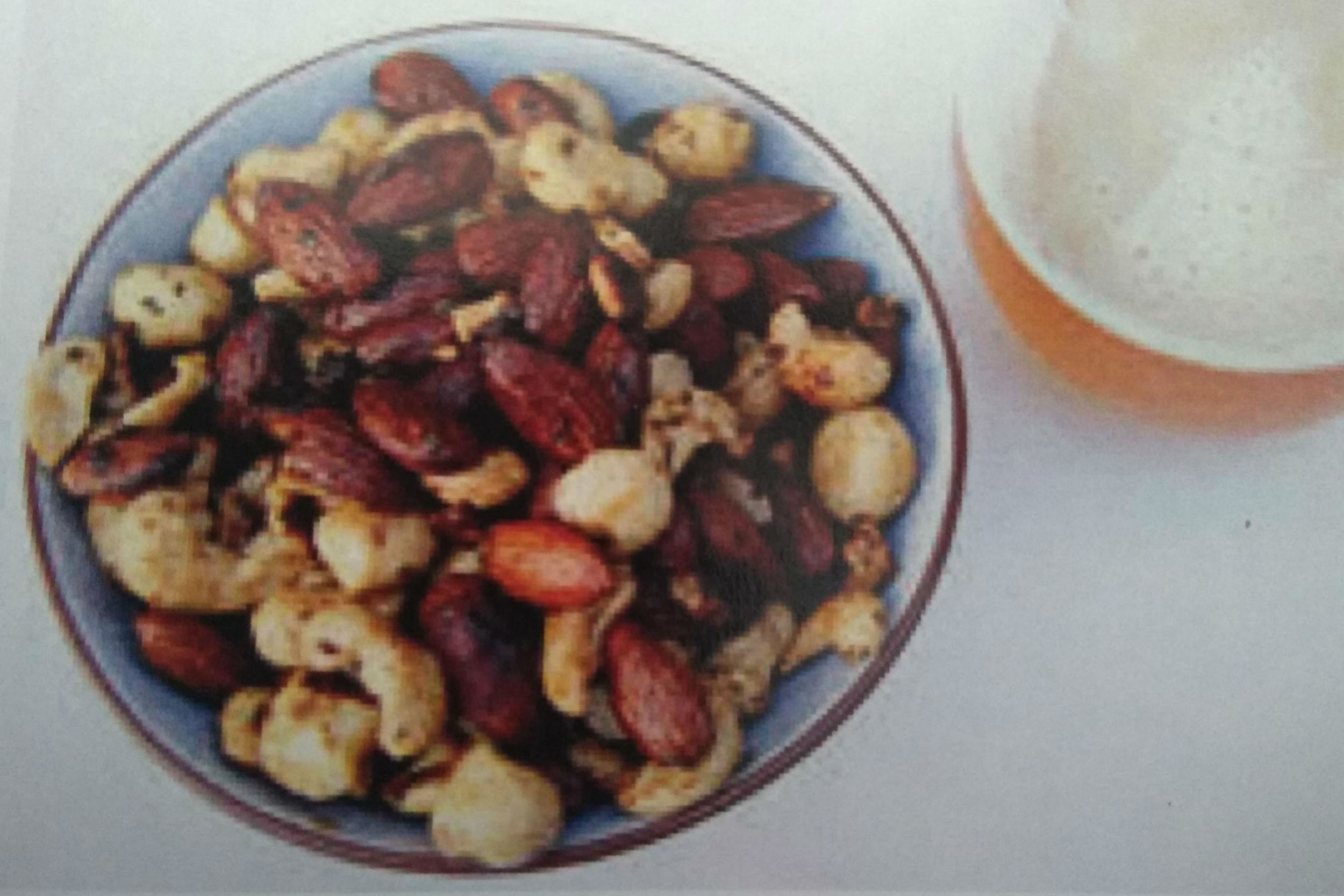 mixed nuts with spices in a small bowl